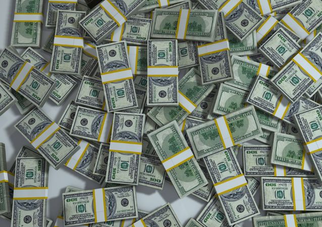 A pile of american money from a real estate return on investment is pictured, taking up the whole frame.